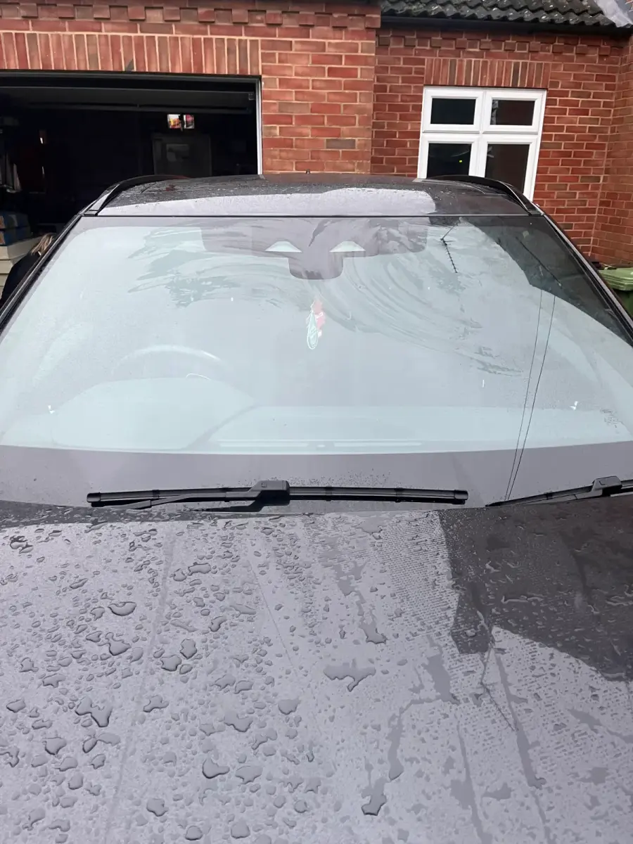 A freshly fitted windscreen, clean and undamaged, on an EliteScreens customer's car